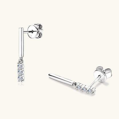 Close up detail of moissanite stone setting in premium 925 sterling silver huggie hoop earrings