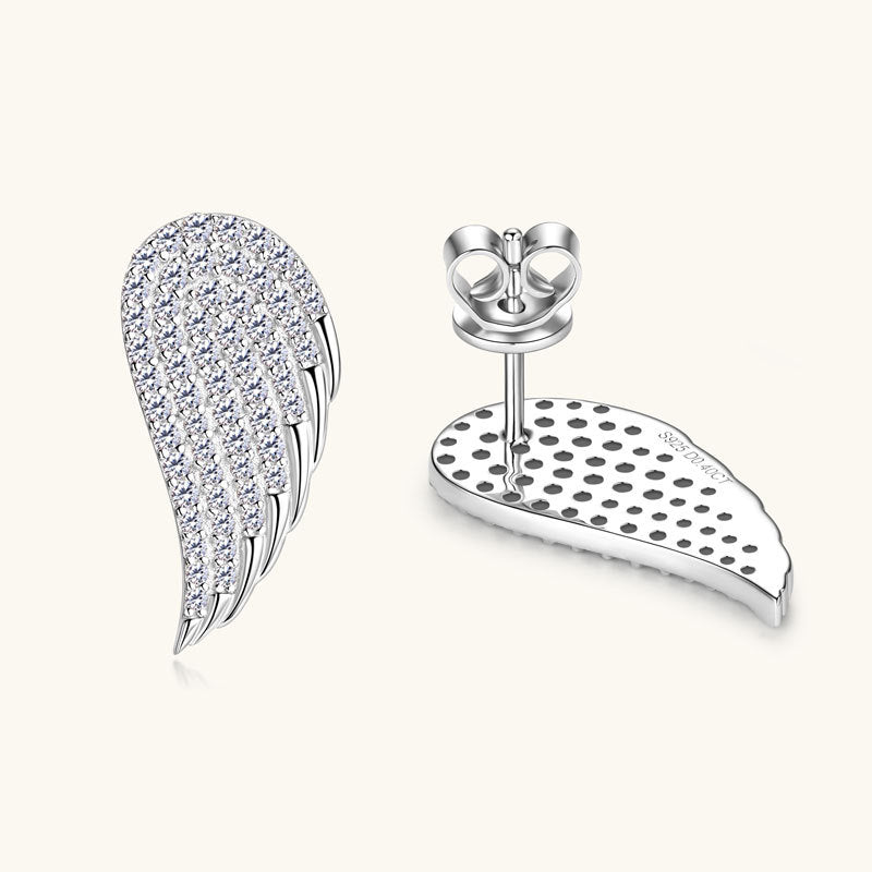 Close-up detail of moissanite stones in sterling silver huggie hoops showcasing diamond-like brilliance and clarity