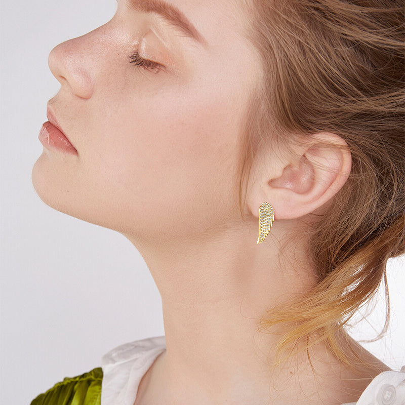 Elegant display of moissanite huggie hoop earrings highlighting the sophisticated design and premium sterling silver quality