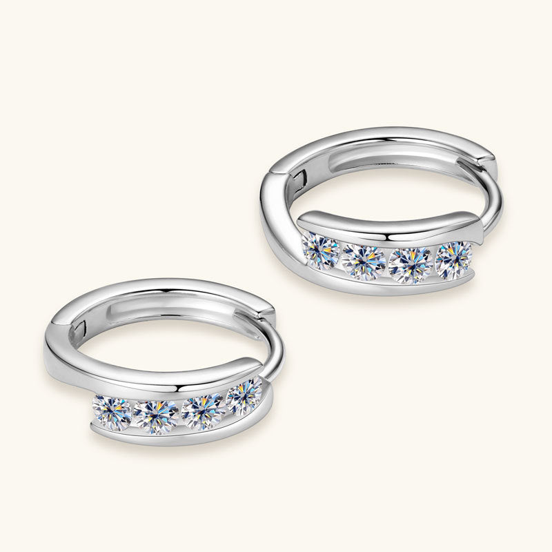 Close up detail of moissanite stone in sterling silver bezel setting with premium finish