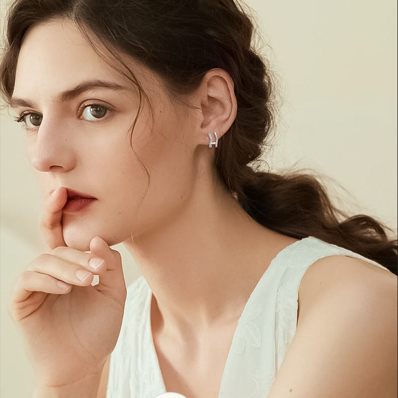 Premium small hoop earrings featuring mirror polished gold finish