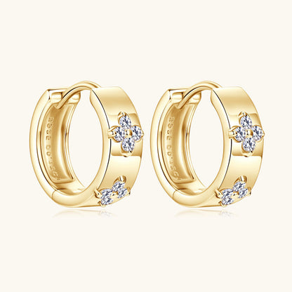 Woman wearing rose gold small hoop earrings in professional setting showcasing elegant minimalist style