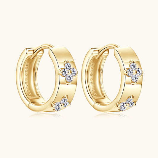 Woman wearing rose gold small hoop earrings in professional setting showcasing elegant minimalist style