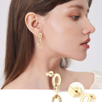Front view of silver hoop earrings with delicate moissanite accents