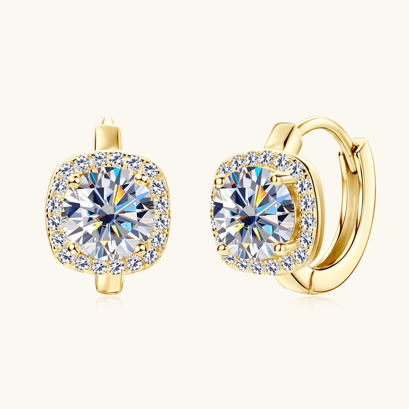 Small silver hoop earrings with a moissanite stone
