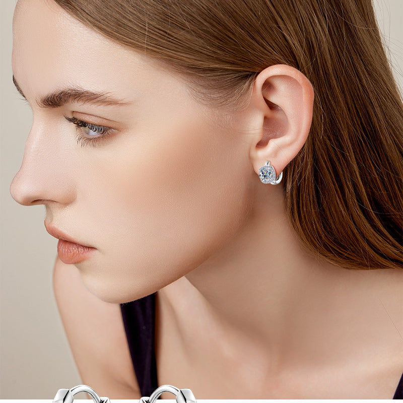 Detail view of moissanite in a sterling silver hoop