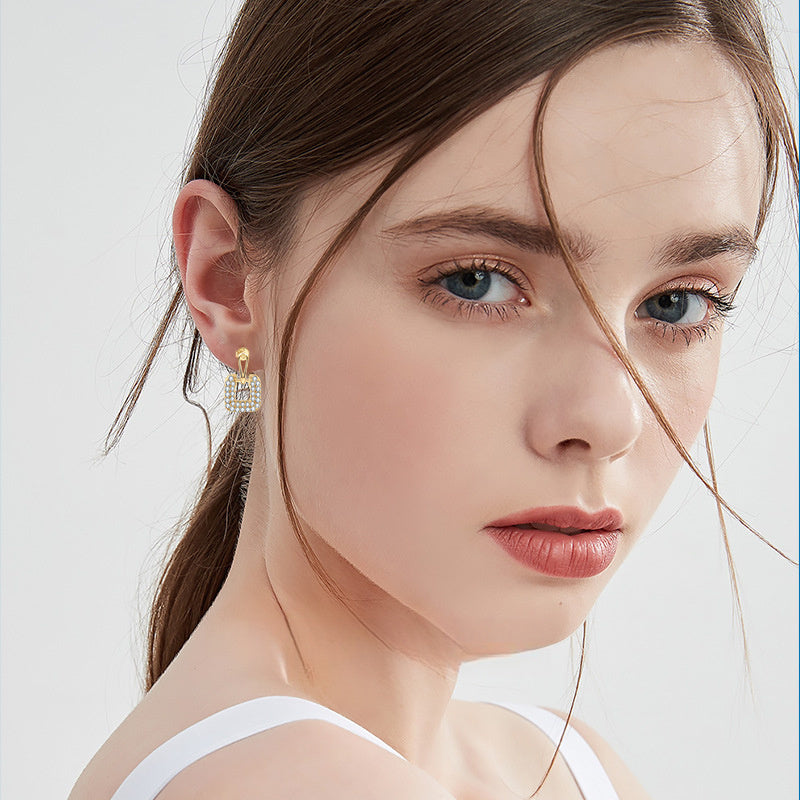 Elegant dangle earring showing lever back closure