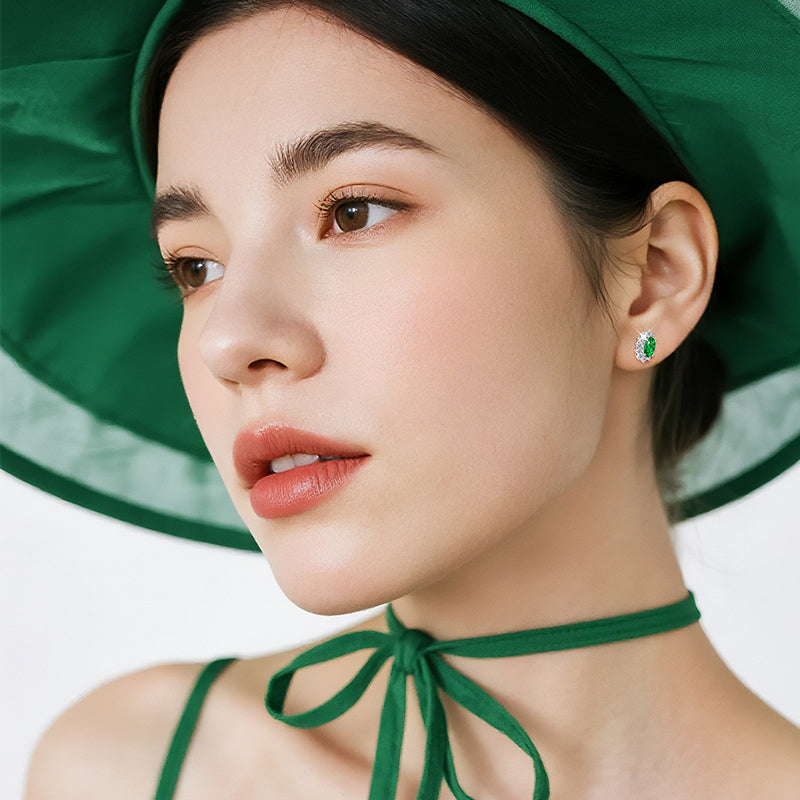 Close-up of star shaped earring with cubic zirconia