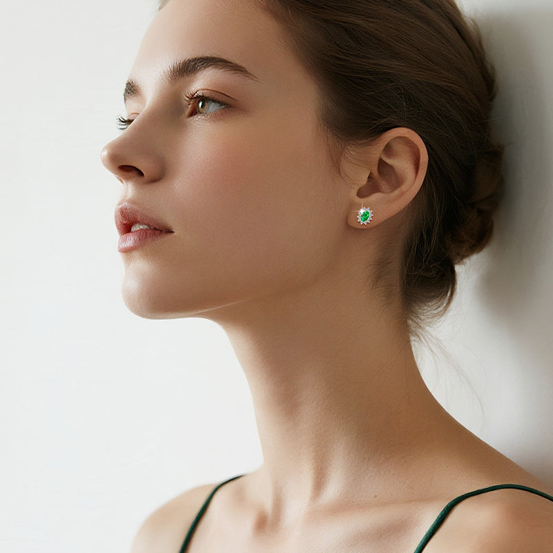 Elegant small star stud with green emerald stone