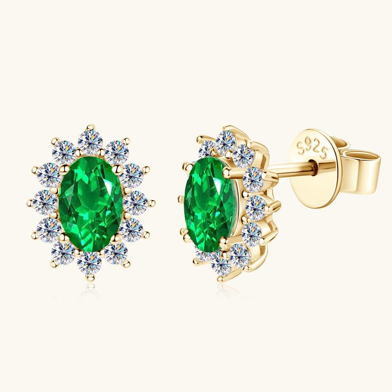 Star earring with emerald and zircon details