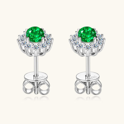 Star shaped emerald earrings lifestyle shot