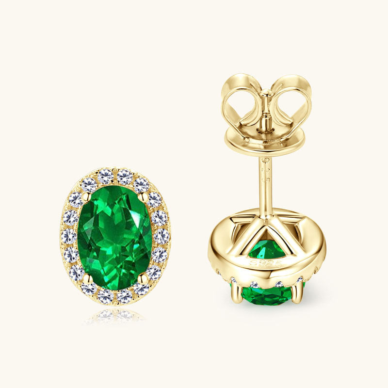 Small hoop earrings with star design and emerald stone