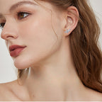 Elegant star trail moissanite stud earrings side view 8