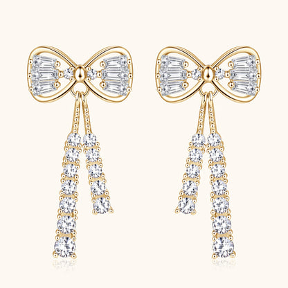 Sterling silver bow stud earrings with polished finish and flat back design