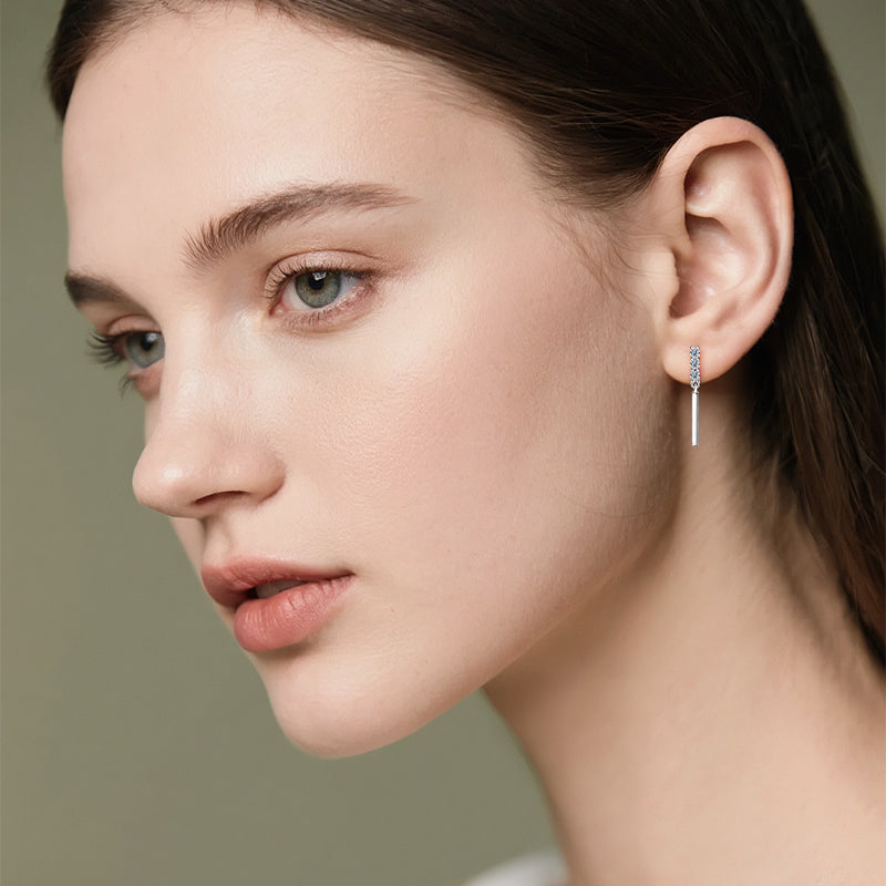 Professional styling with sterling silver moissanite huggie earrings for workplace elegance