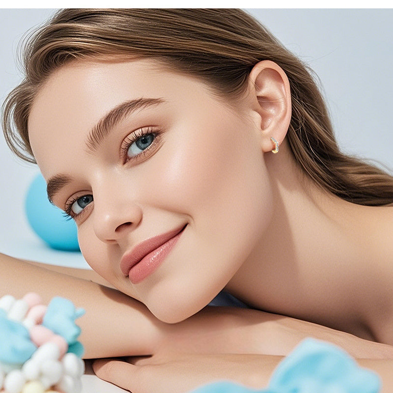 Professional styling with sterling silver earrings in workplace setting
