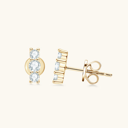 Woman wearing sterling silver moissanite flat back studs in professional business attire