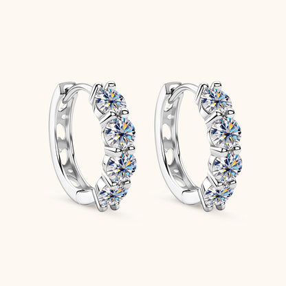 Professional model showcasing moissanite huggie hoop earrings elegant styling