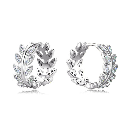 Close up view of sterling silver leaf studs craftsmanship