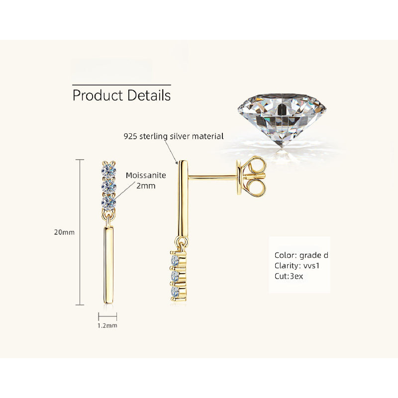 Lifestyle photo of sterling silver moissanite huggie earrings styled for everyday professional wear