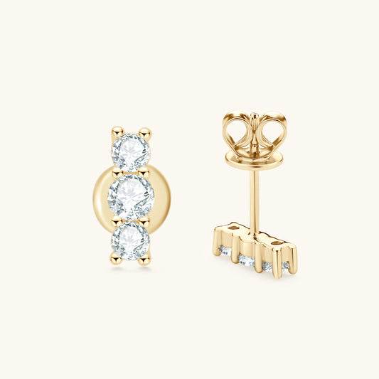 Sterling silver moissanite flat back stud earrings with brilliant sparkle on white background