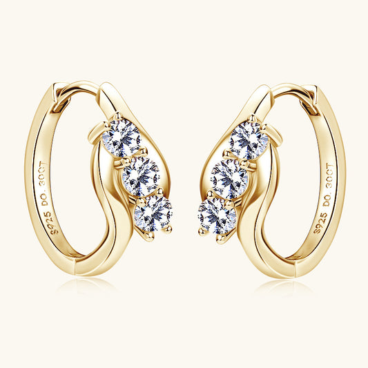 Sterling silver huggie hoop earrings with moissanite stones front view showing brilliant sparkle