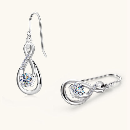 Model wearing elegant teardrop dangle earrings lifestyle shot