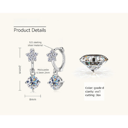 Lifestyle shot of woman wearing sterling silver moissanite earrings